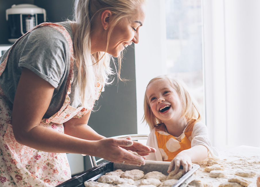 Mother baking with child making pastry